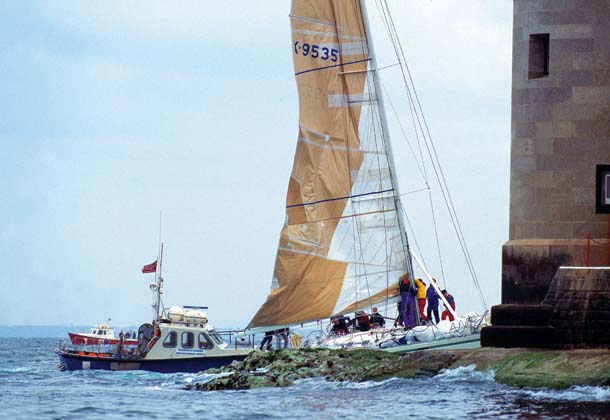 Left: Spirit of the North receiving assistance after hitting Goose Rock off The Needles in 1995. Photo: Jamie Lawson-Johnston/PPL