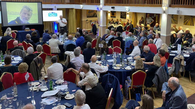 Jean-Luc Van Den Heede entertains fellow Cape Horners with tales of his many roundings. Credit: IACH