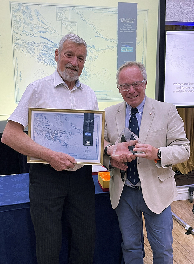Jean-Luc Van Den Heede receiving an award from Andrew Pindar