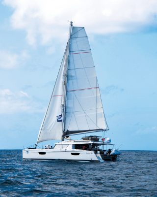 pacific-sailing-homeschooling-World-ARC2019-fountaine-pajot-saba-50-catamaran-RAID-side-view