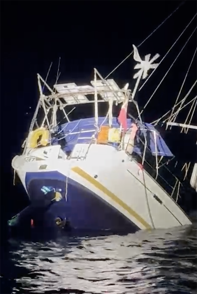 A sinking yacht after an orca encounter